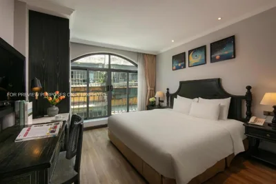 Habitación comunicada con balcón — The Emissary Hanoi Hotel & Spa