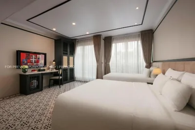 Habitación cuádruple Deluxe — The Emissary Hanoi Hotel & Spa