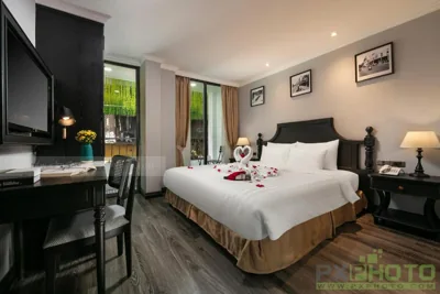 Junior Suite con balcón — The Emissary Hanoi Hotel & Spa